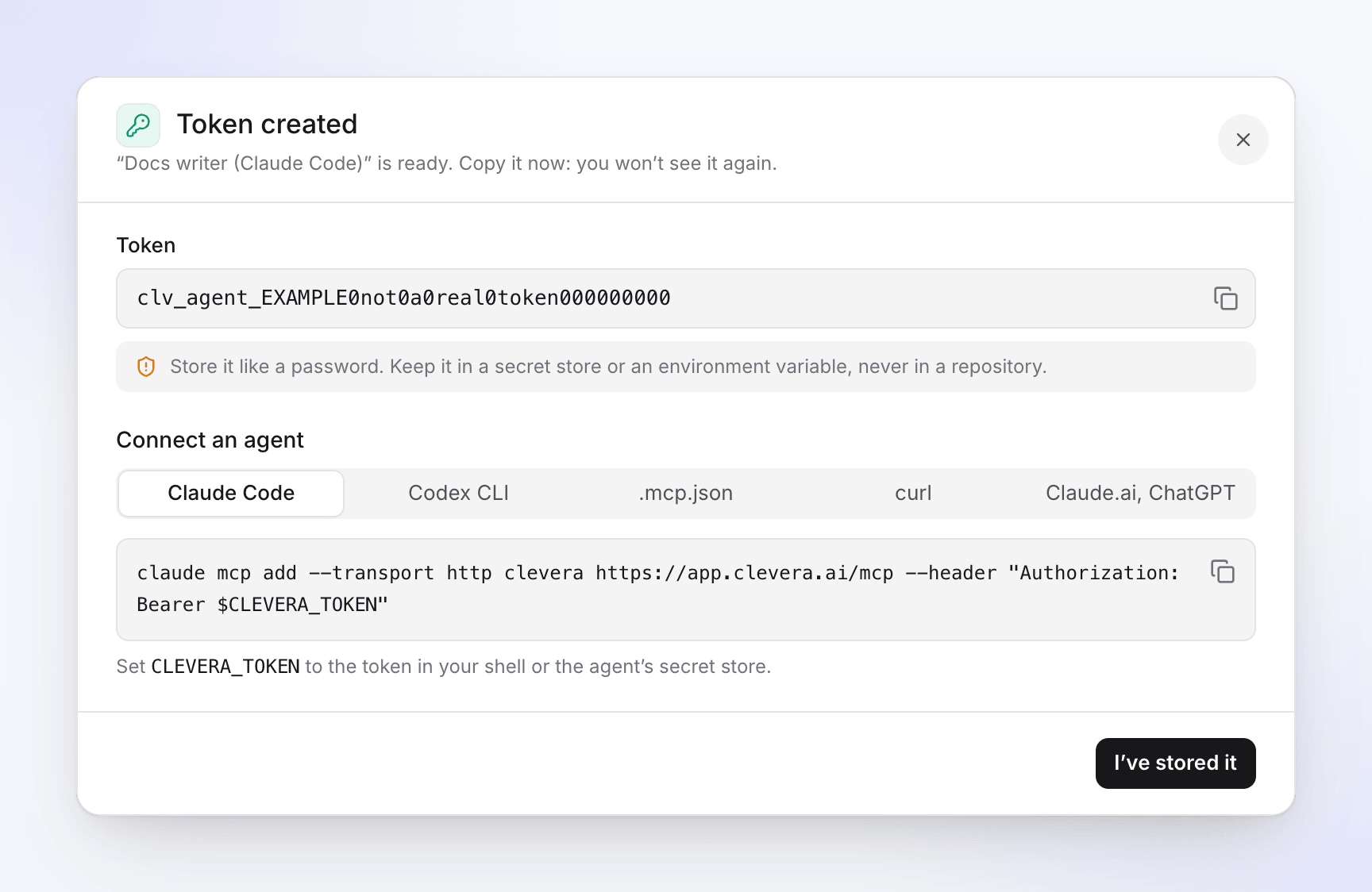 The Token created dialog showing the new token once, with ready-to-paste setup commands for Claude Code, Codex CLI, .mcp.json and curl.